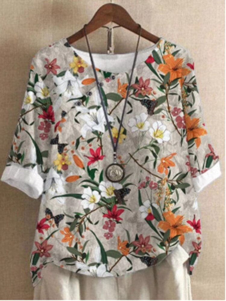 Tina | Bluse mit Blumendruck und entspannter Passform mit Knopfdetails - Image 9